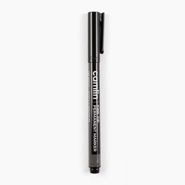 Camlin black permanent marker with fine tip and cap removed