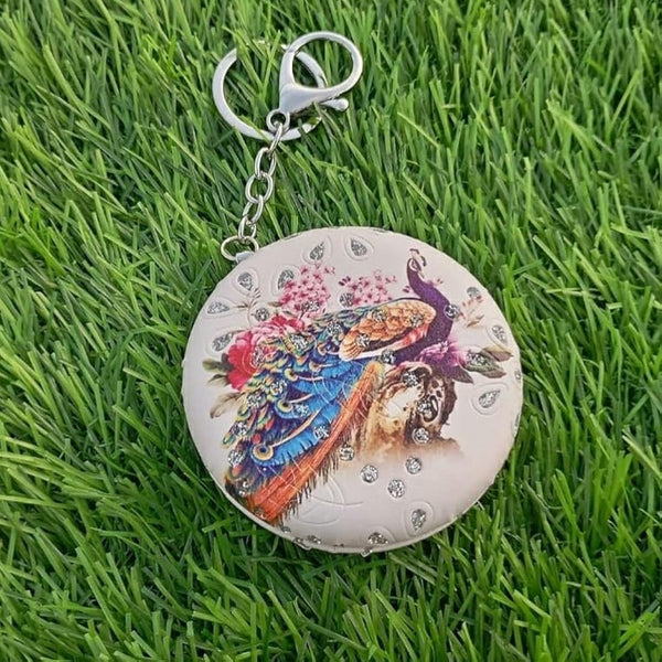Round mirror peacock keychain with diamond cut edge