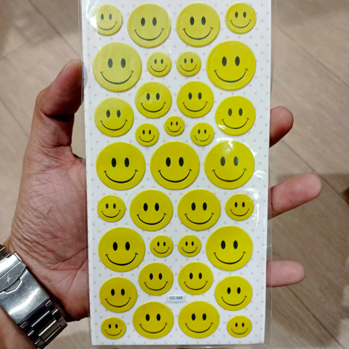 Emoji sticker sheet showing 34 assorted emoji designs