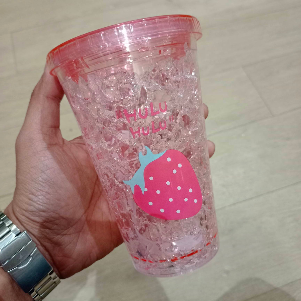 Crystal glass sipper shown from a different angle on plain background