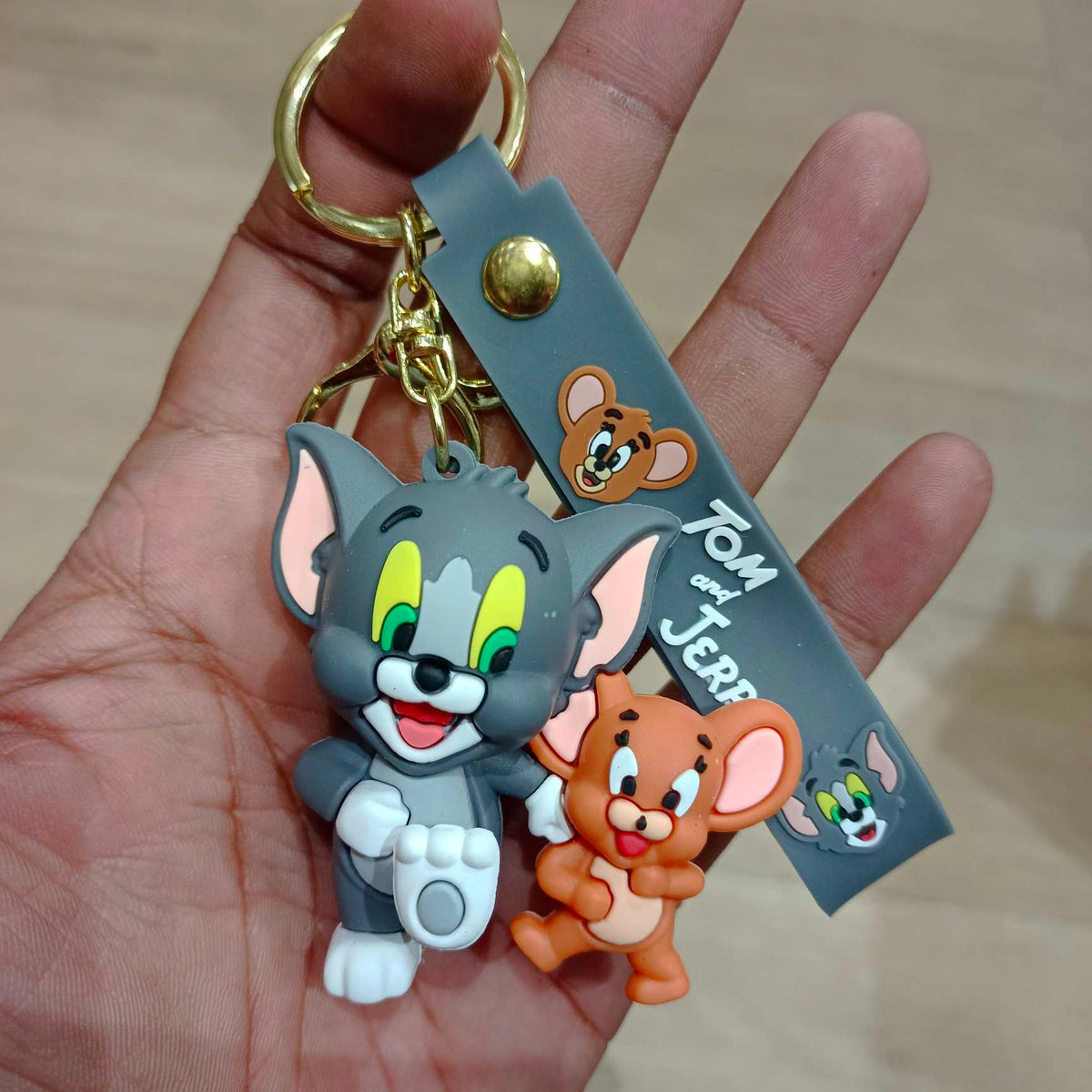 Cat and mouse cartoon style rubber keychain walking pose