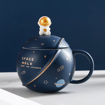 Space-theme ceramic mug with astronaut design and stirrer