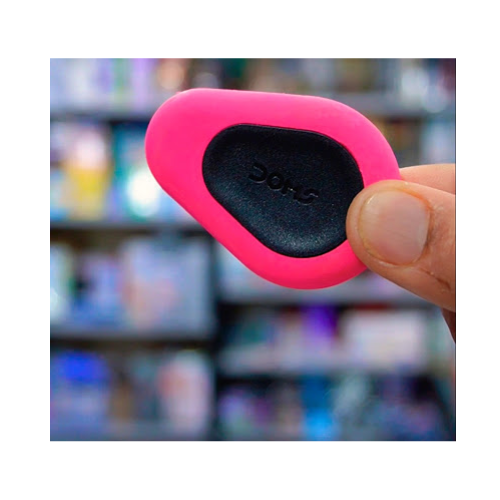 Doms Grip Pop eraser with ergonomic grip on plain background