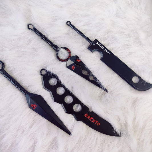 Metal kunai-shaped anime keychain with keyring loop attached