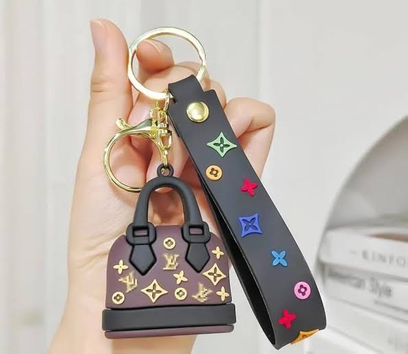 Rubber handbag-shaped keychain with monogram print design